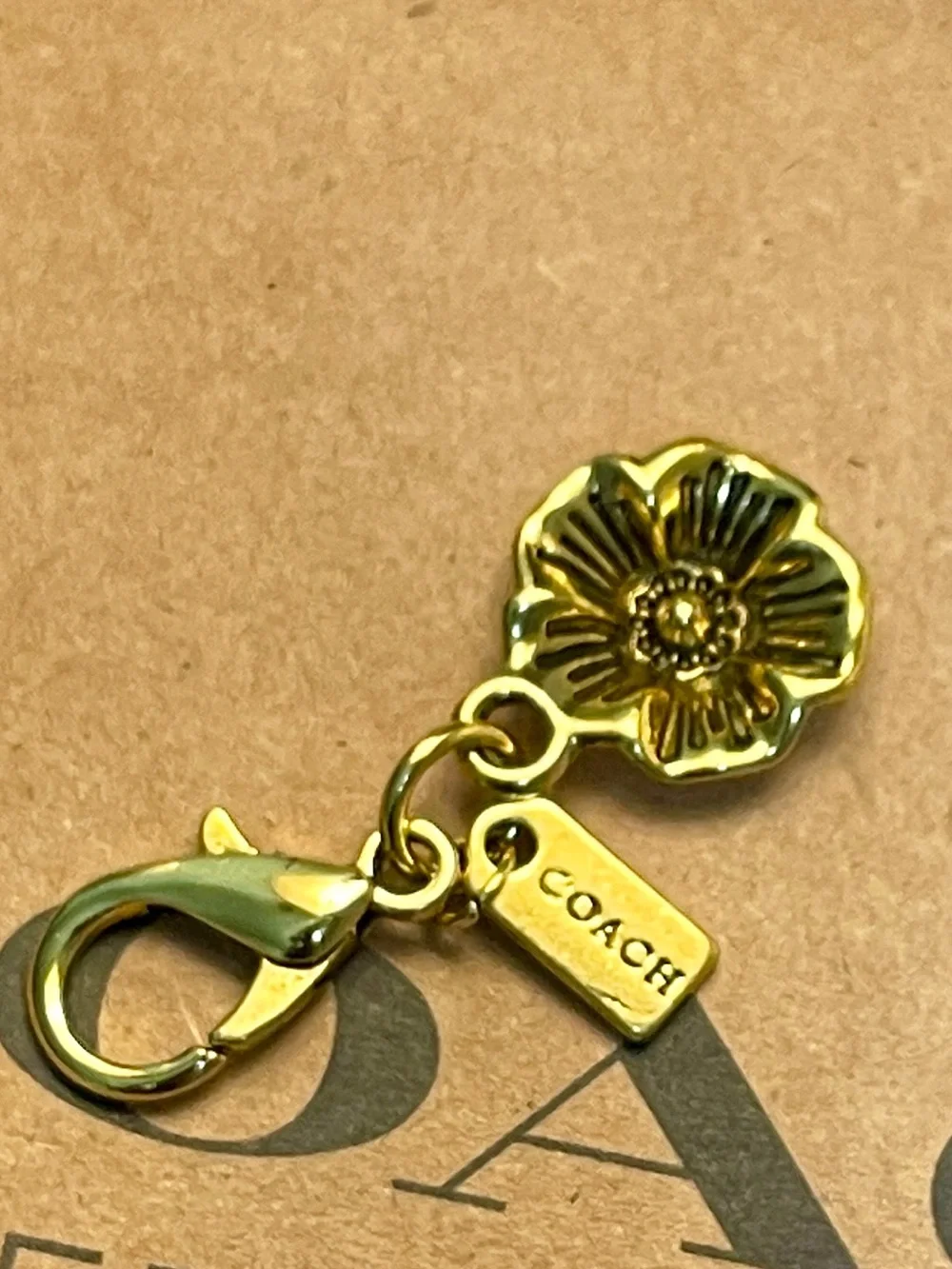 Coach Gold Floral Charm Keychain